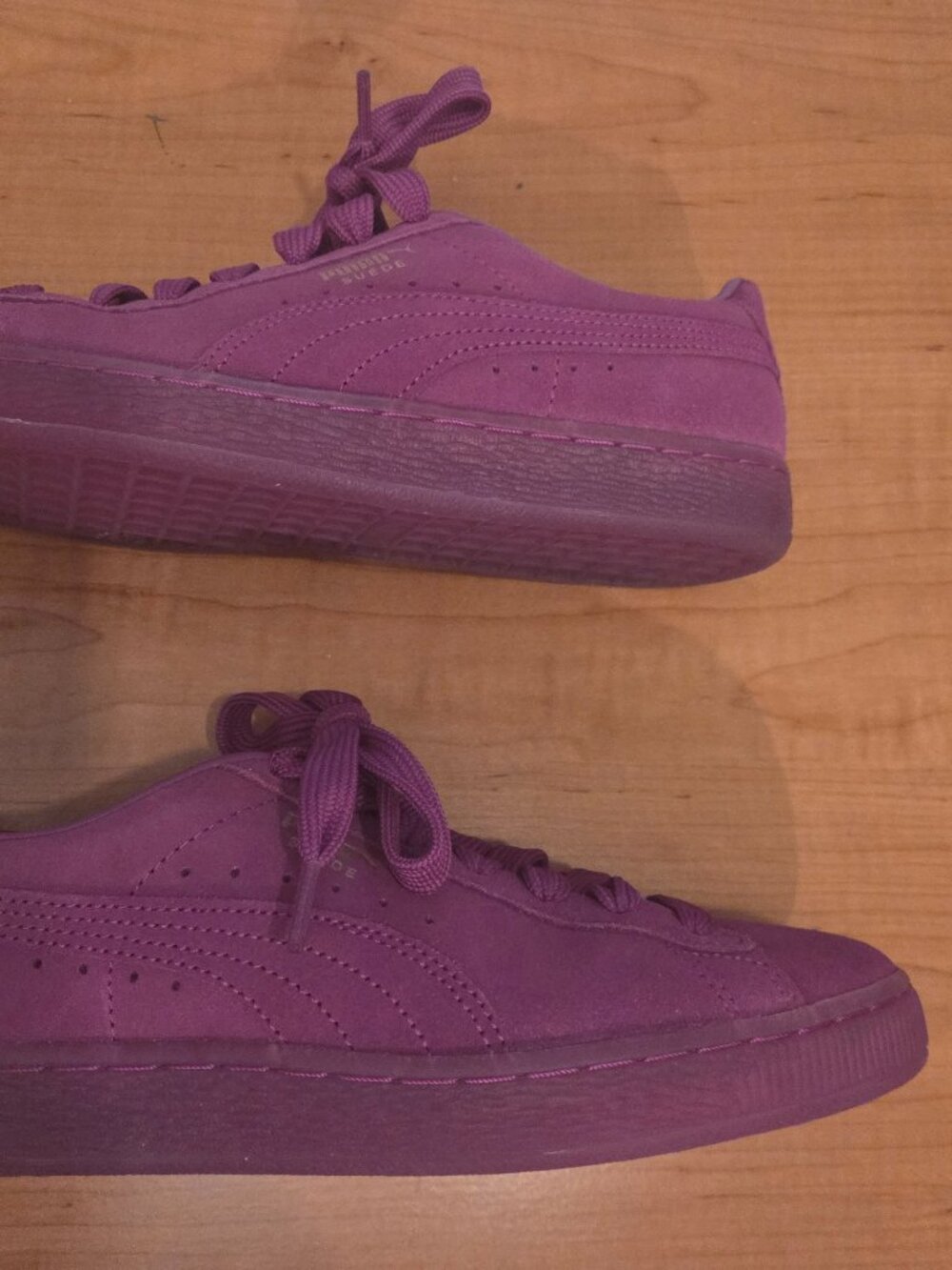 Purple suede pumas